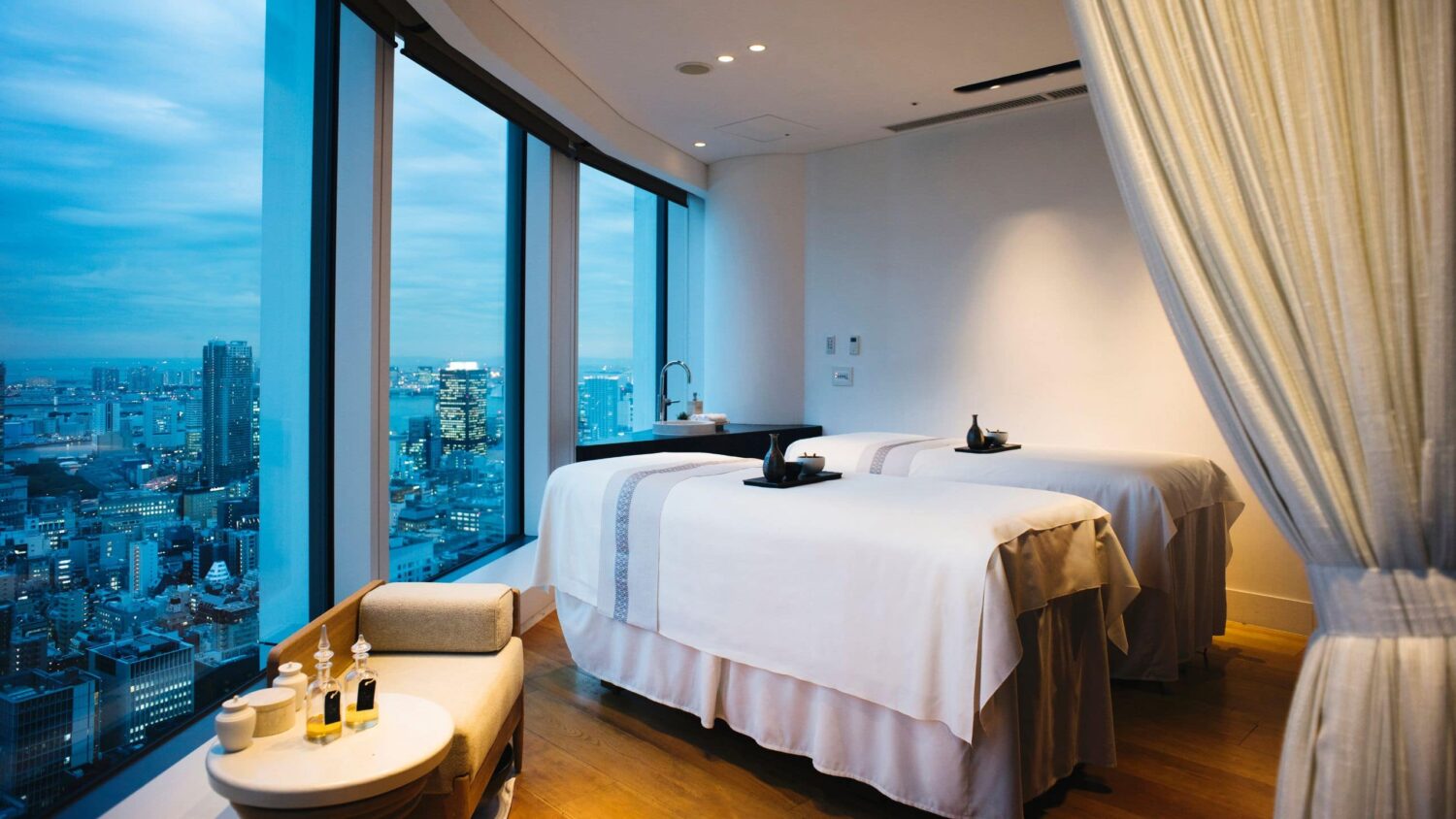 Treatment room with skyline views at AO Spa and Club